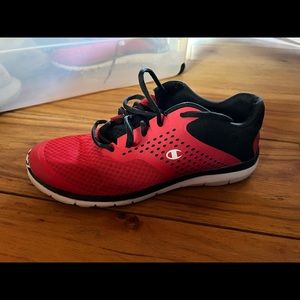 Lightly worn red/black champion running shoe, size 10.5